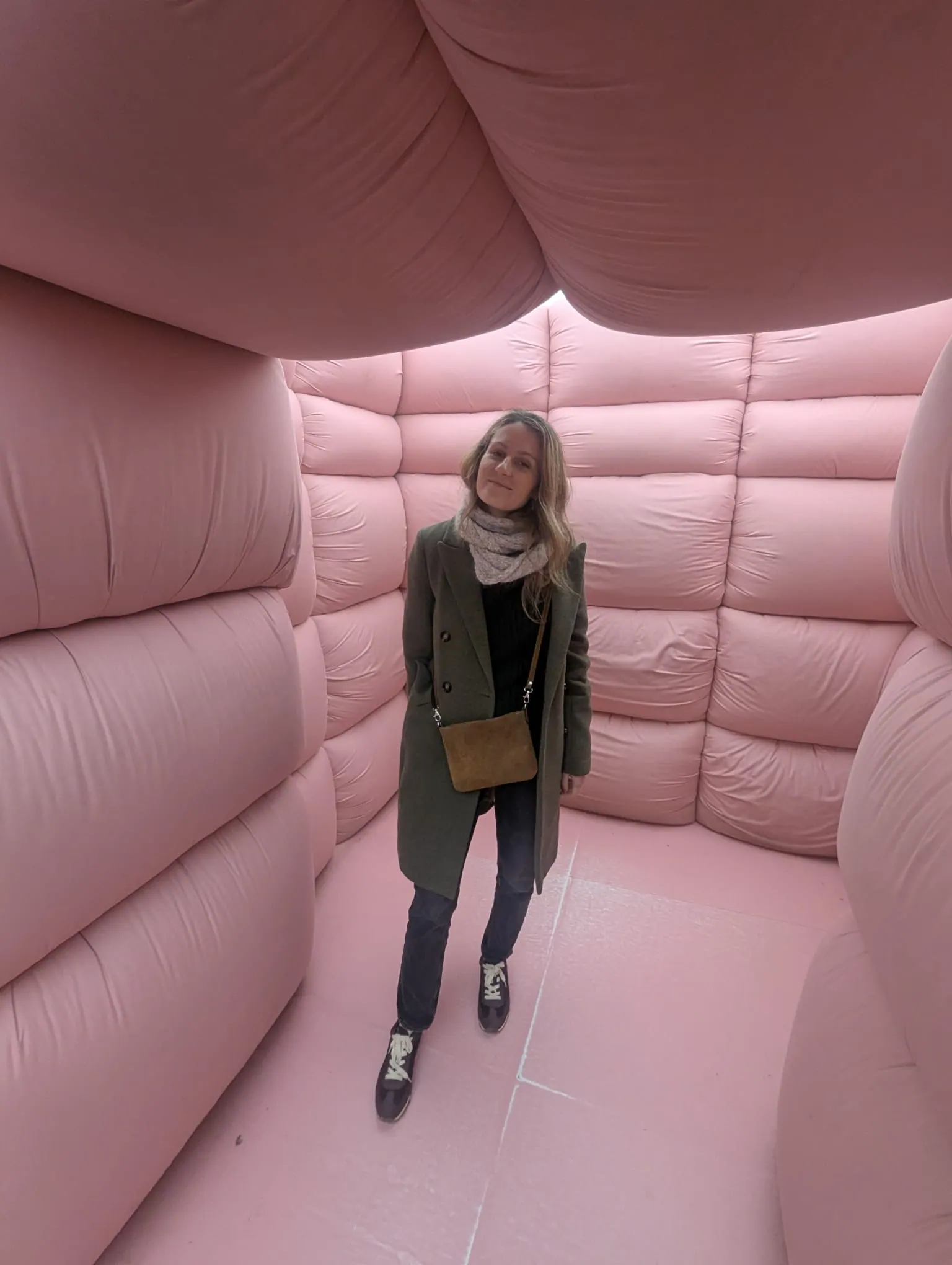 A pink padded room installation inside Moco Museum in Amsterdam