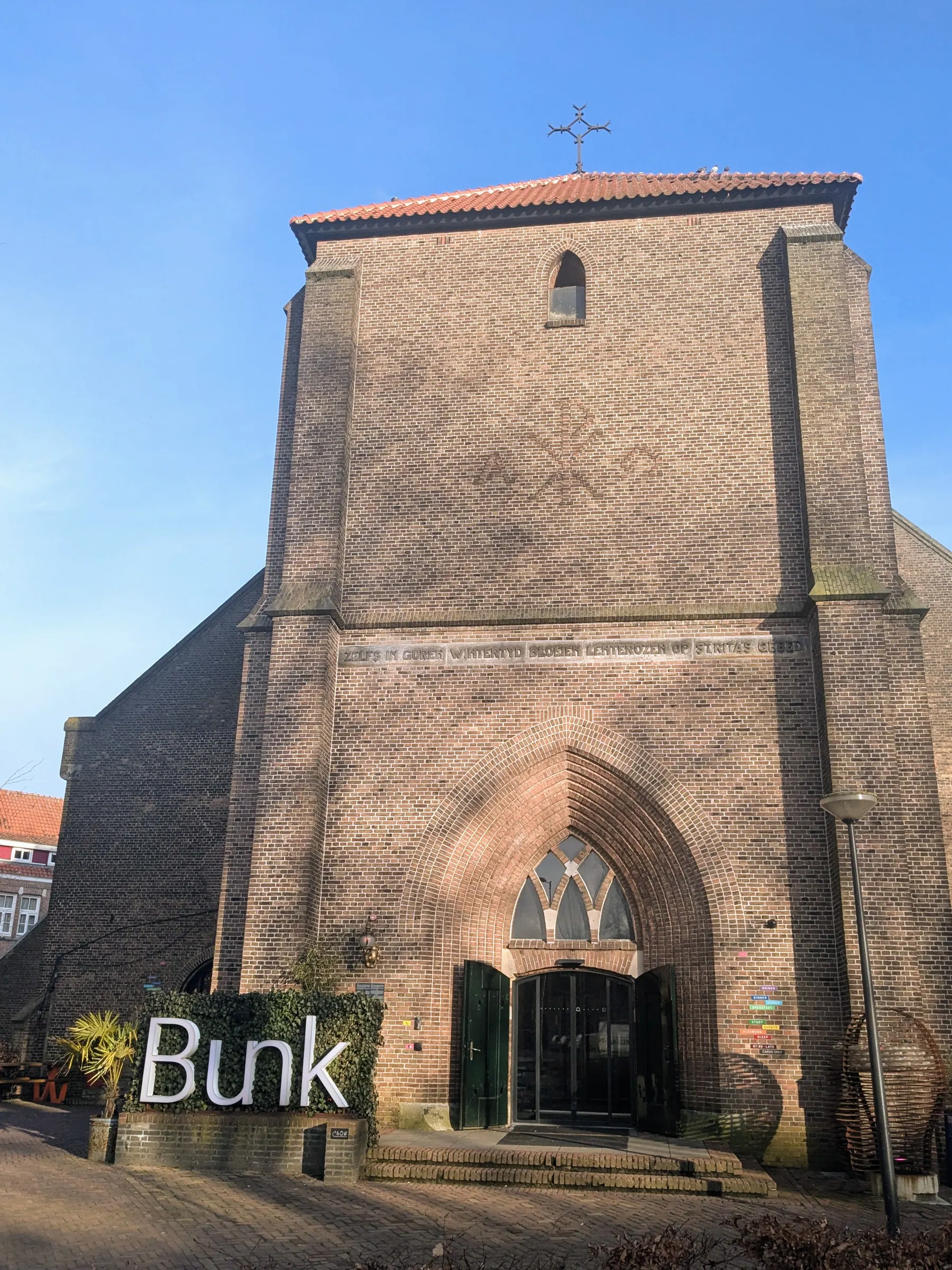 The exterior of Bunk Hotel in Amsterdam Noord, a former church building