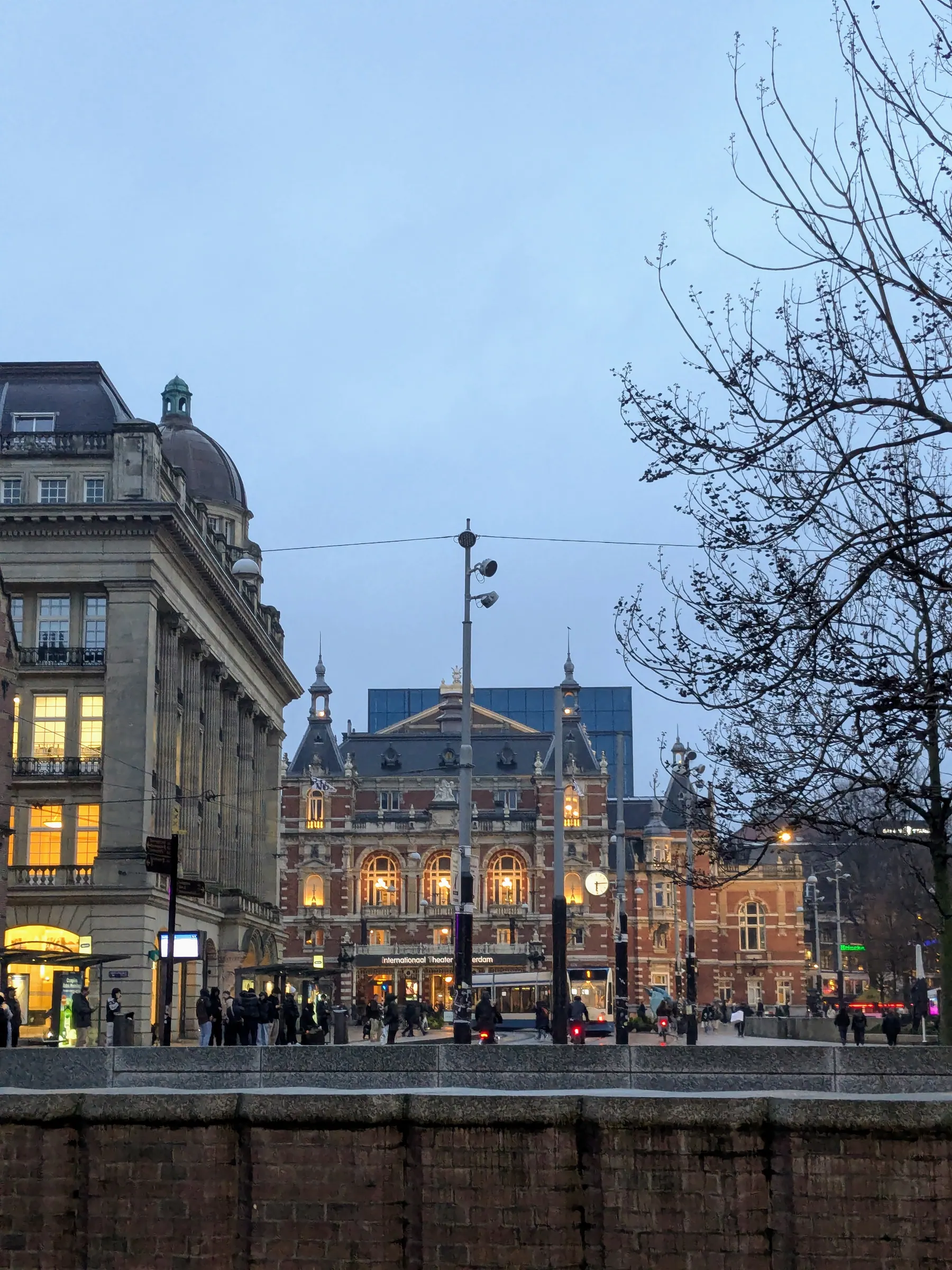 Amsterdam buildings and canals at dusk near the city centre