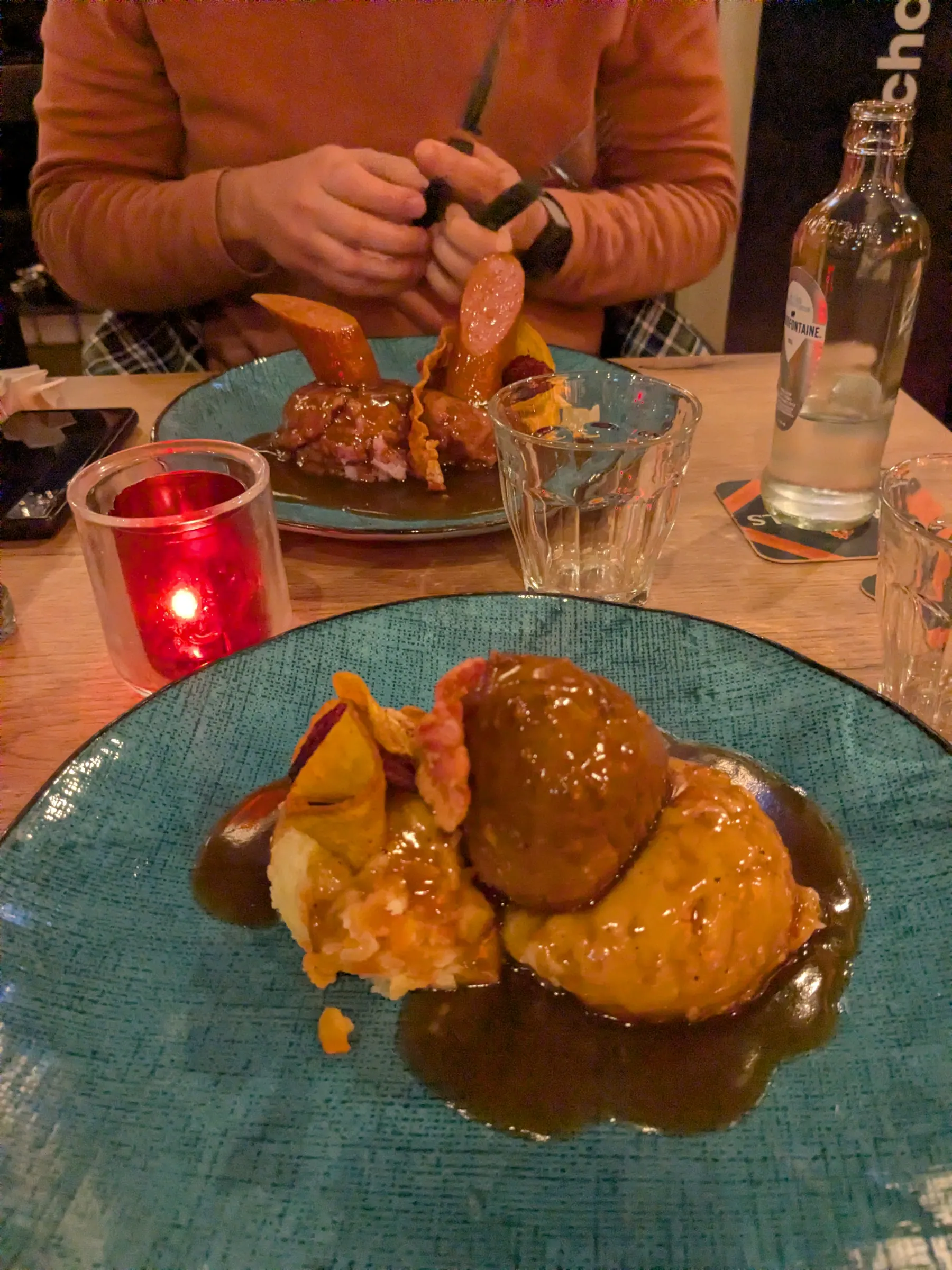A plate of stamppot with meat and sauce at Hollandse Pot in Amsterdam