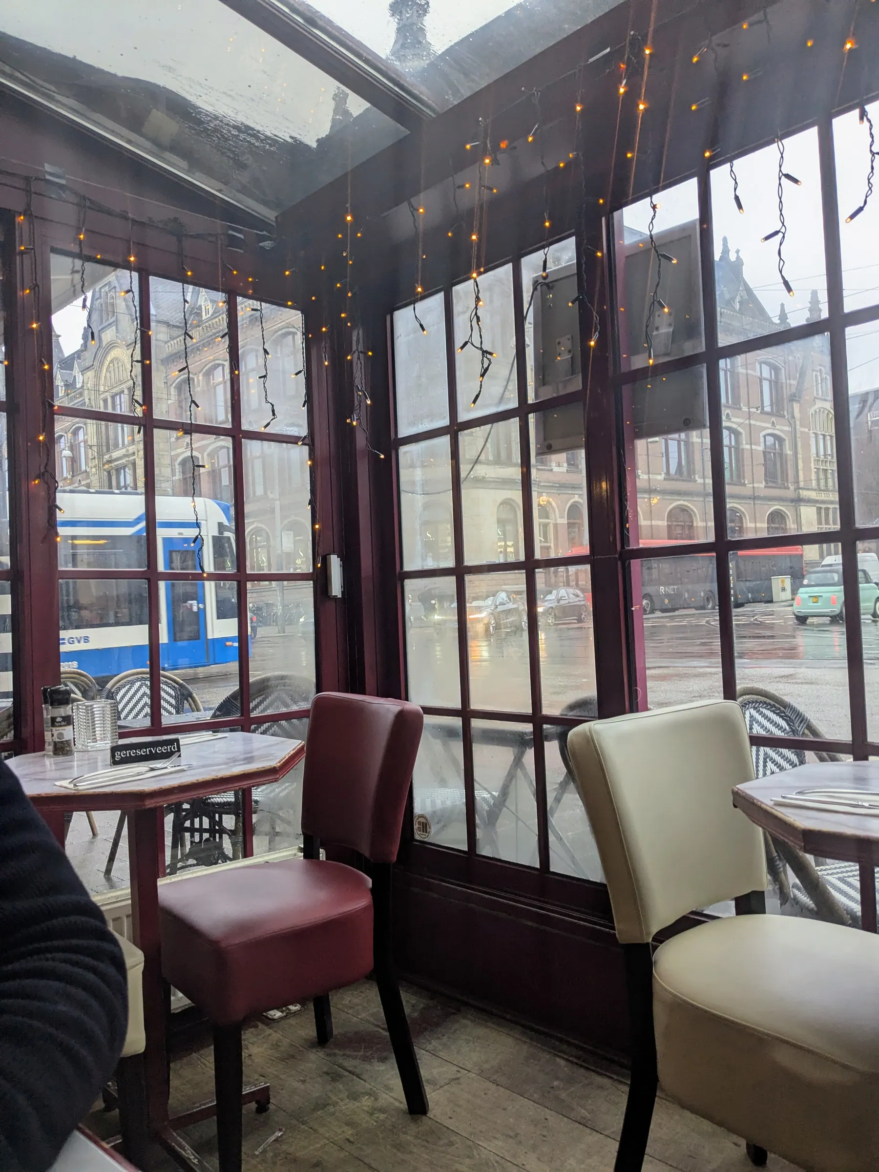 A cafe window seat on a rainy day in Amsterdam