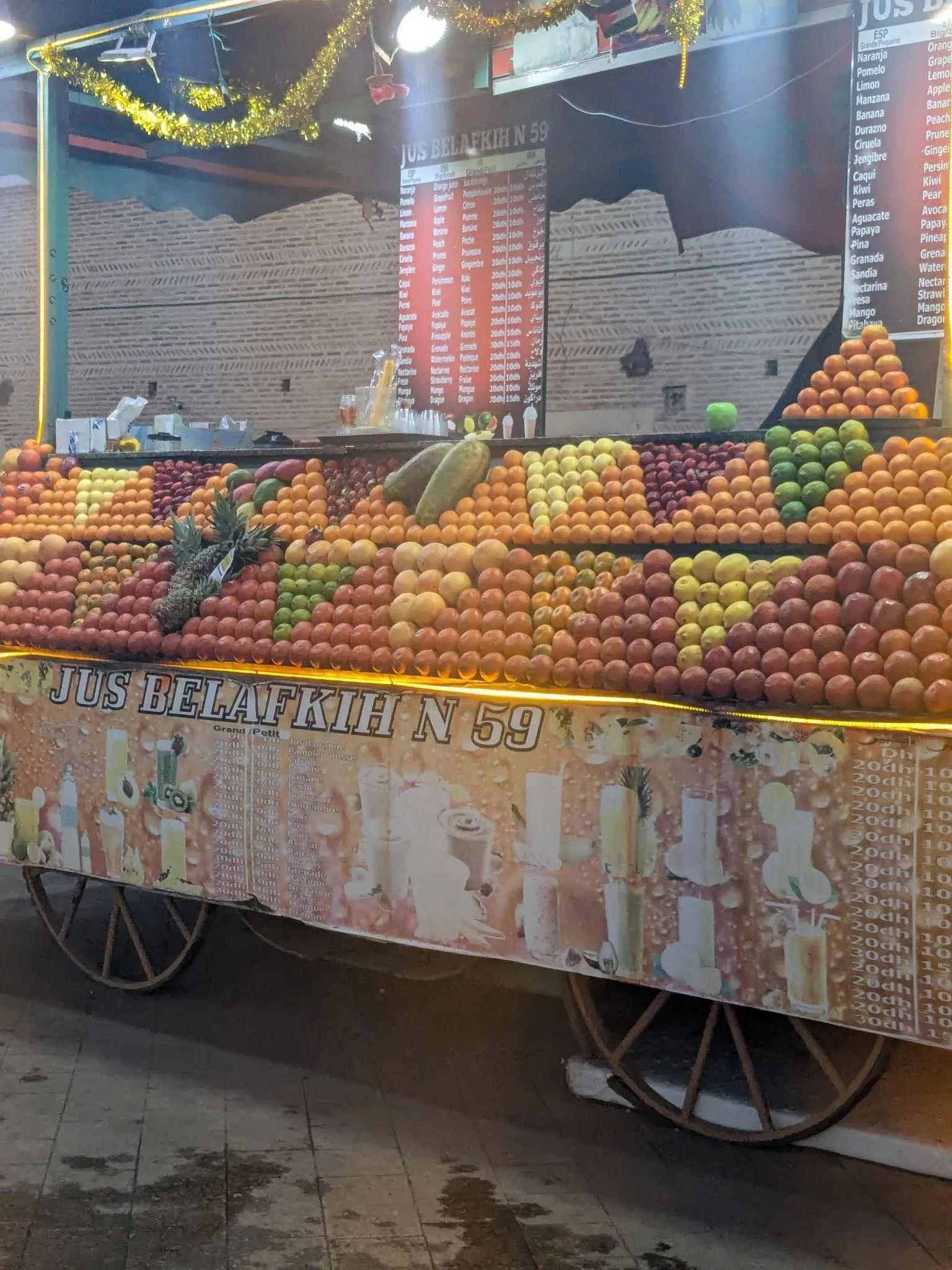 Juice stands piled with fruit in Jemaa el-Fna square in Marrakech