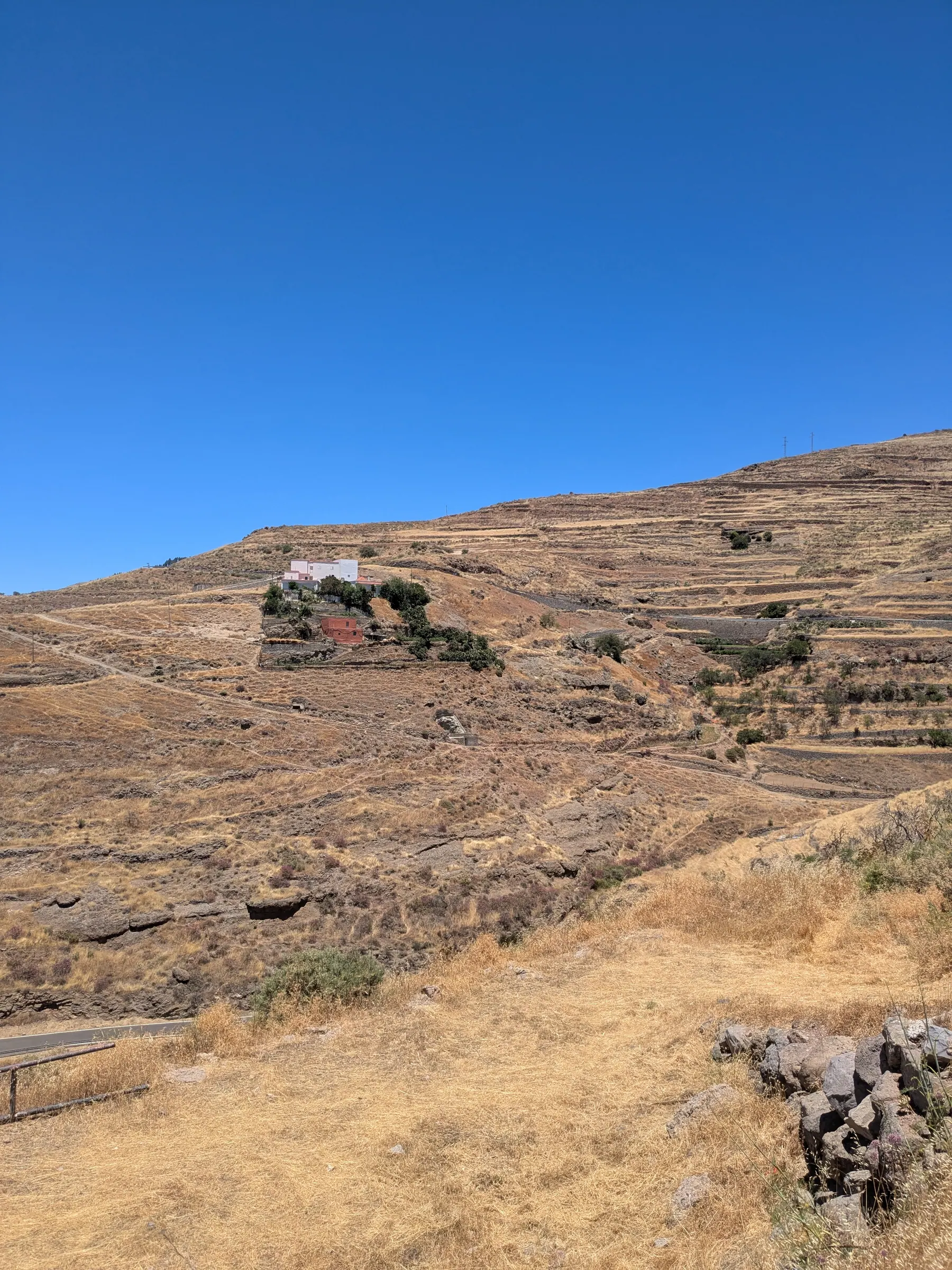Rugged agricultural terraces and dry slopes near Barranco Hondo