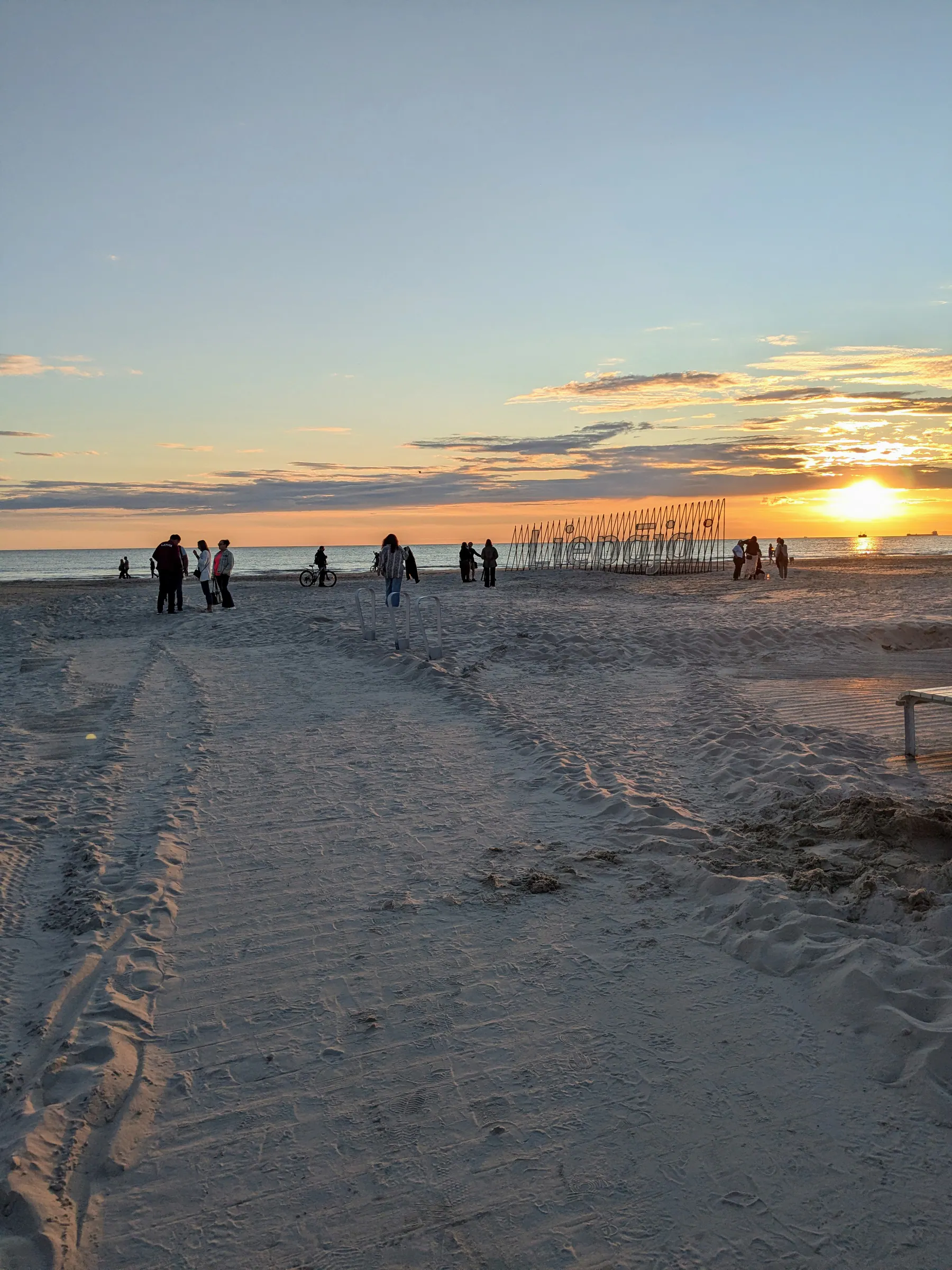 Sunset over the wide sandy beach in Liepāja