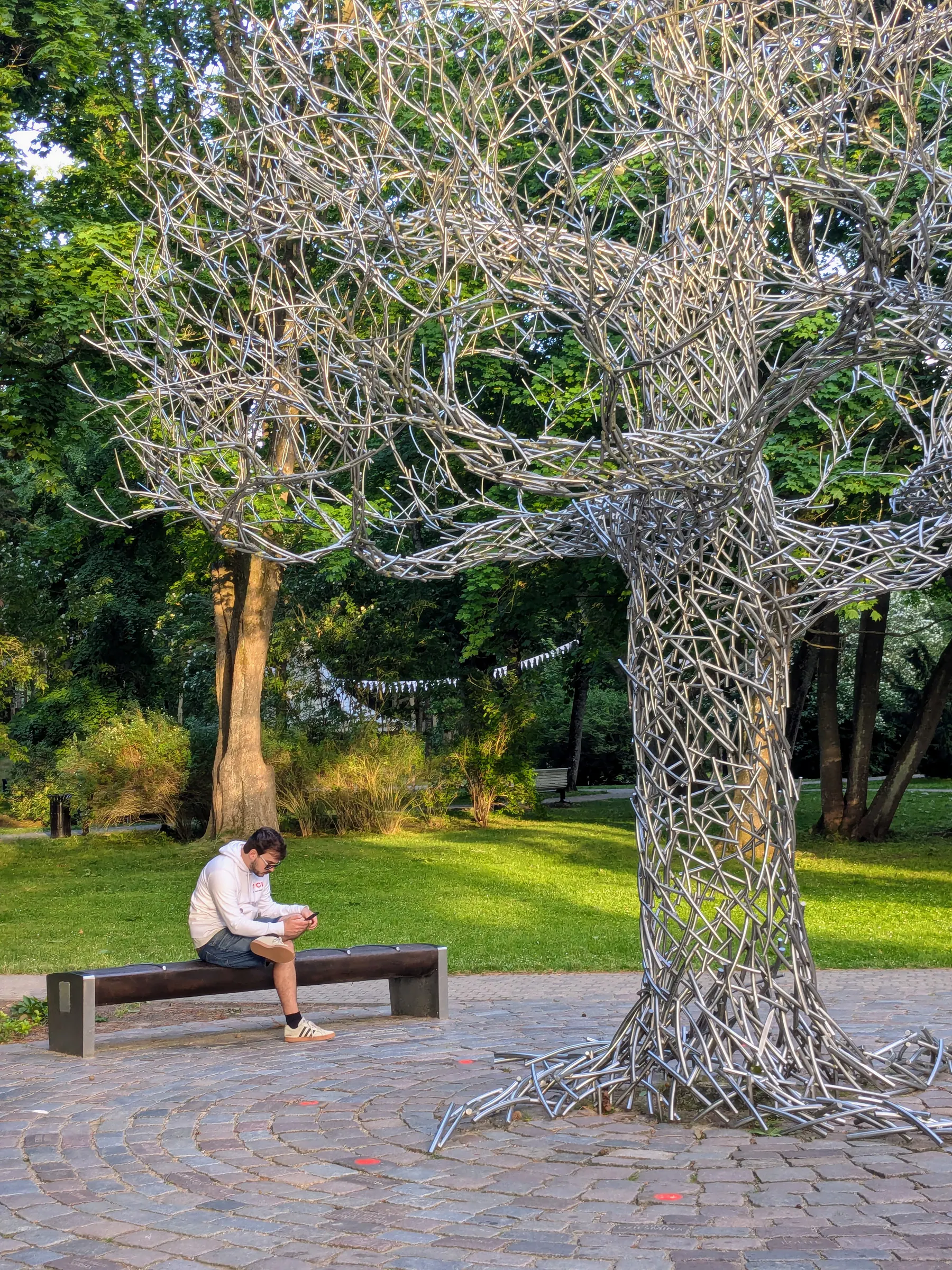 The silver Ghost Tree sculpture in Liepāja Seaside Park