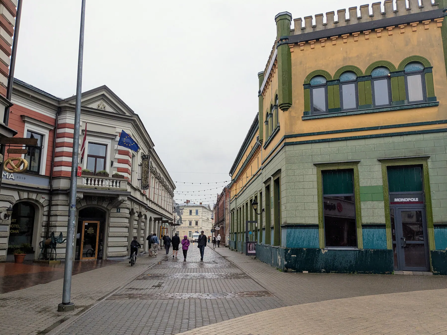 Historic buildings along a pedestrian street in Liepāja's old town