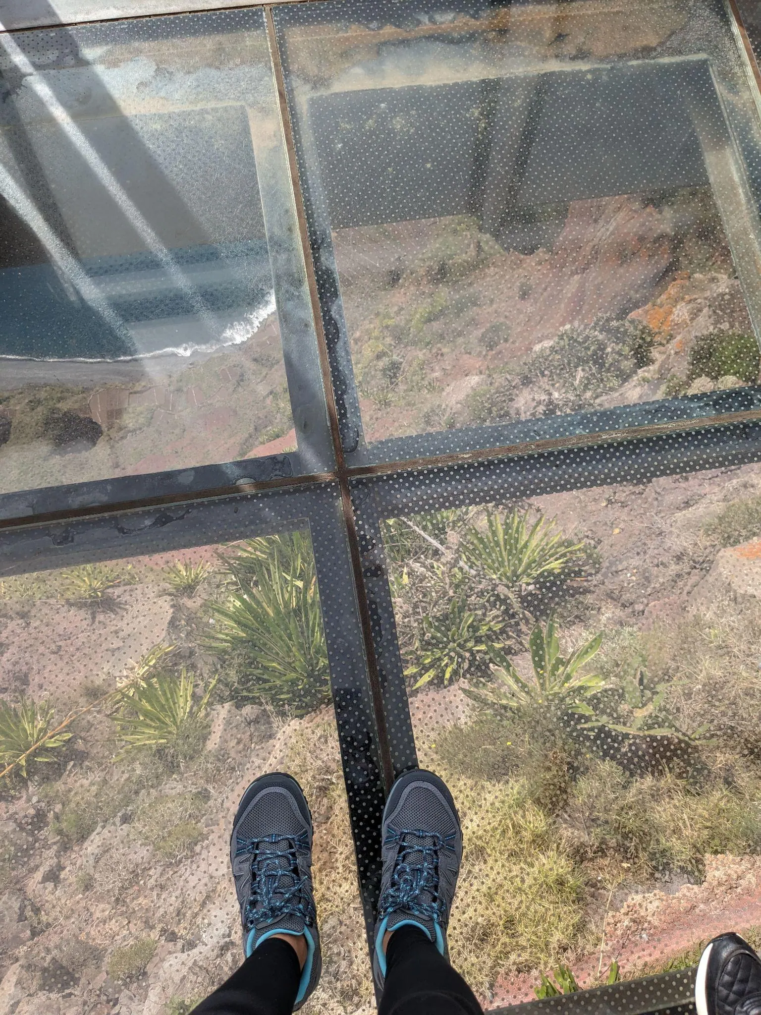 View through the glass floor at Cabo Girão skywalk
