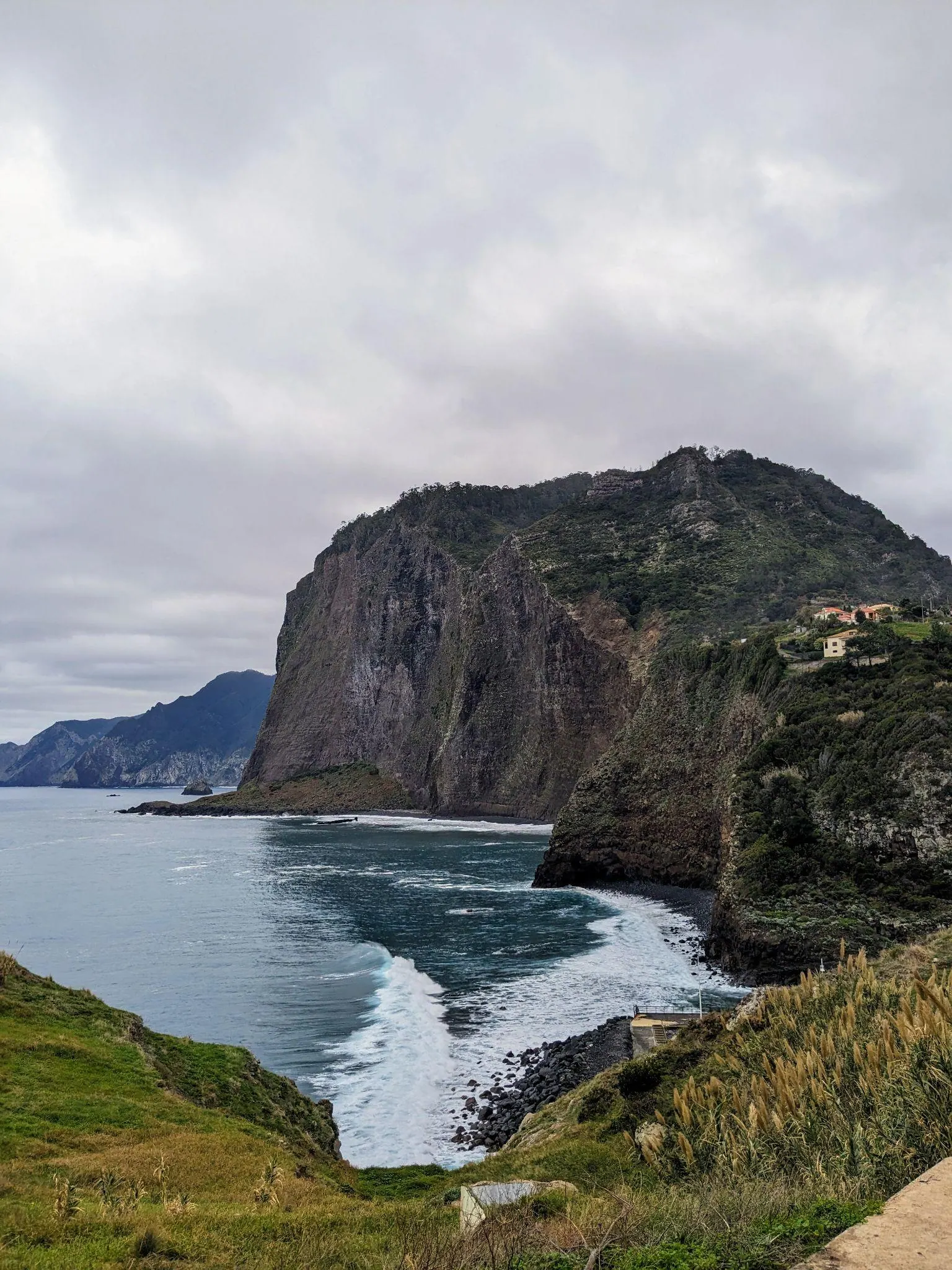 Cloudy cliff view from Miradouro do Guindaste in Madeira