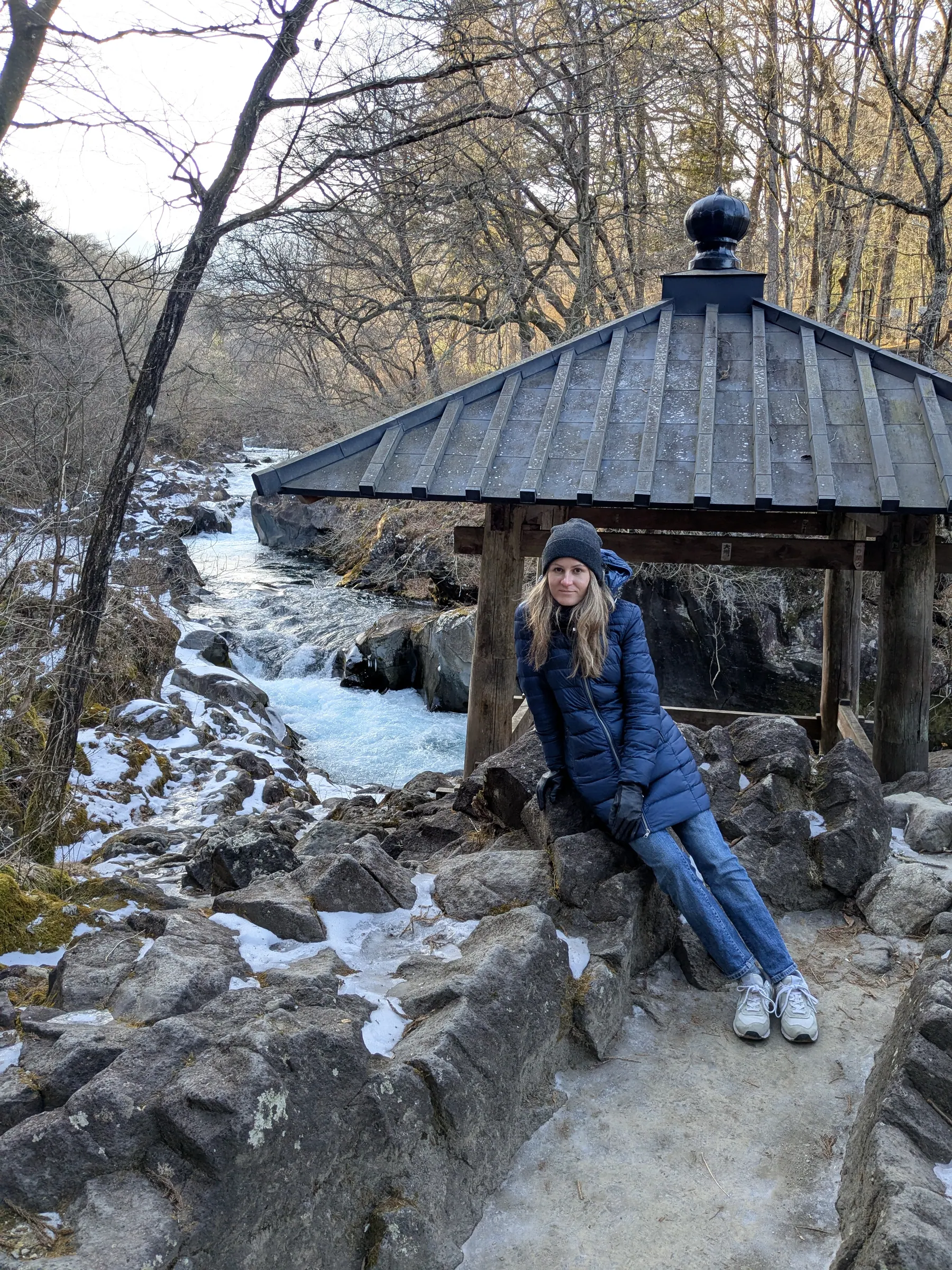 A small bridge over the snowy stream at Kanmangafuchi Abyss
