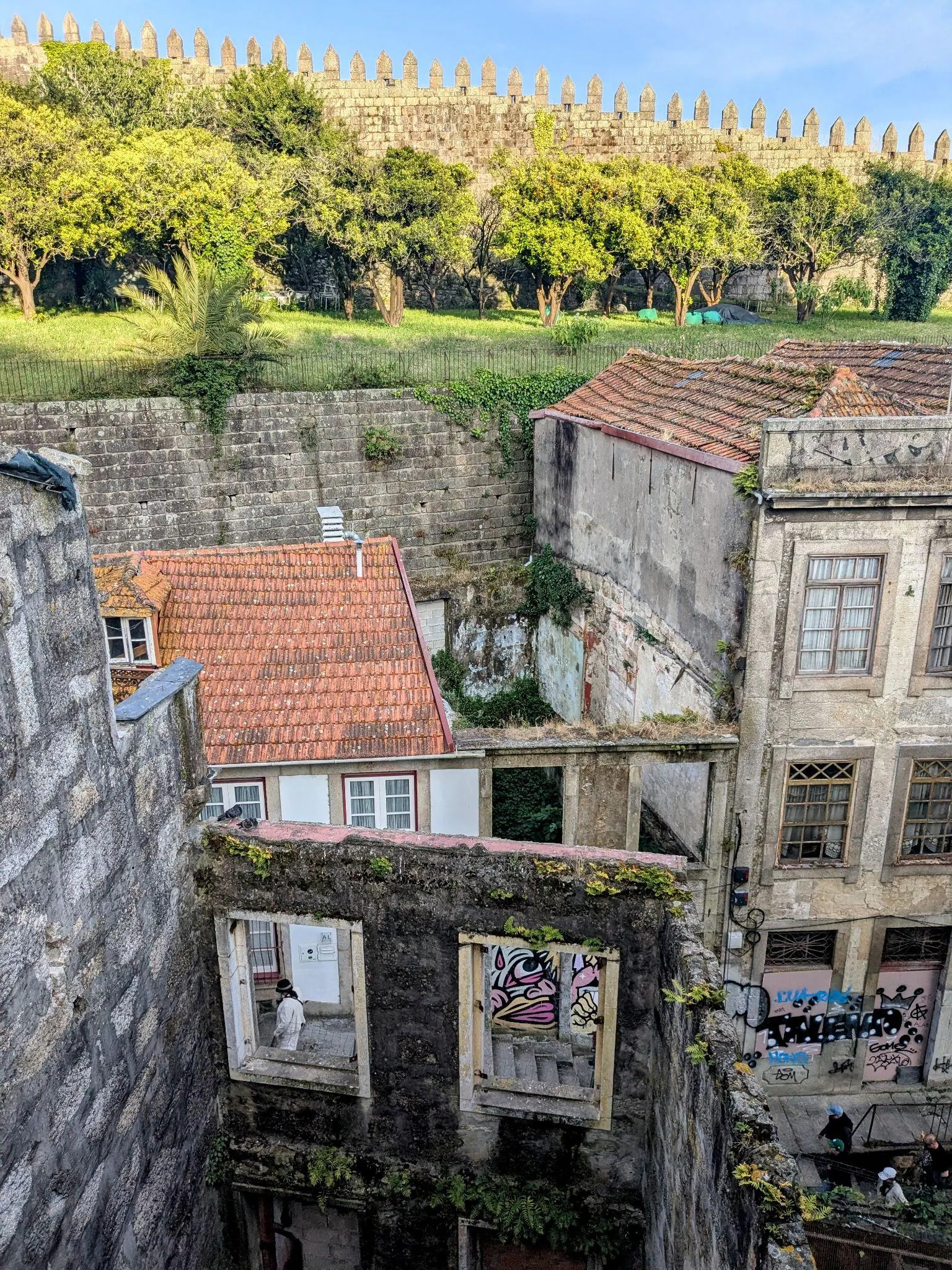 Abandoned houses and old stone walls near central Porto