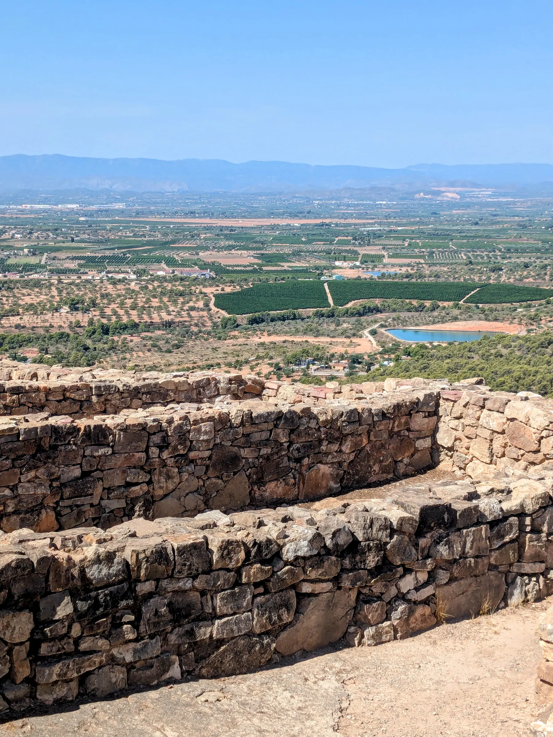 Stone wall marking the edge of the Iberian fortress at Puntal dels Llops