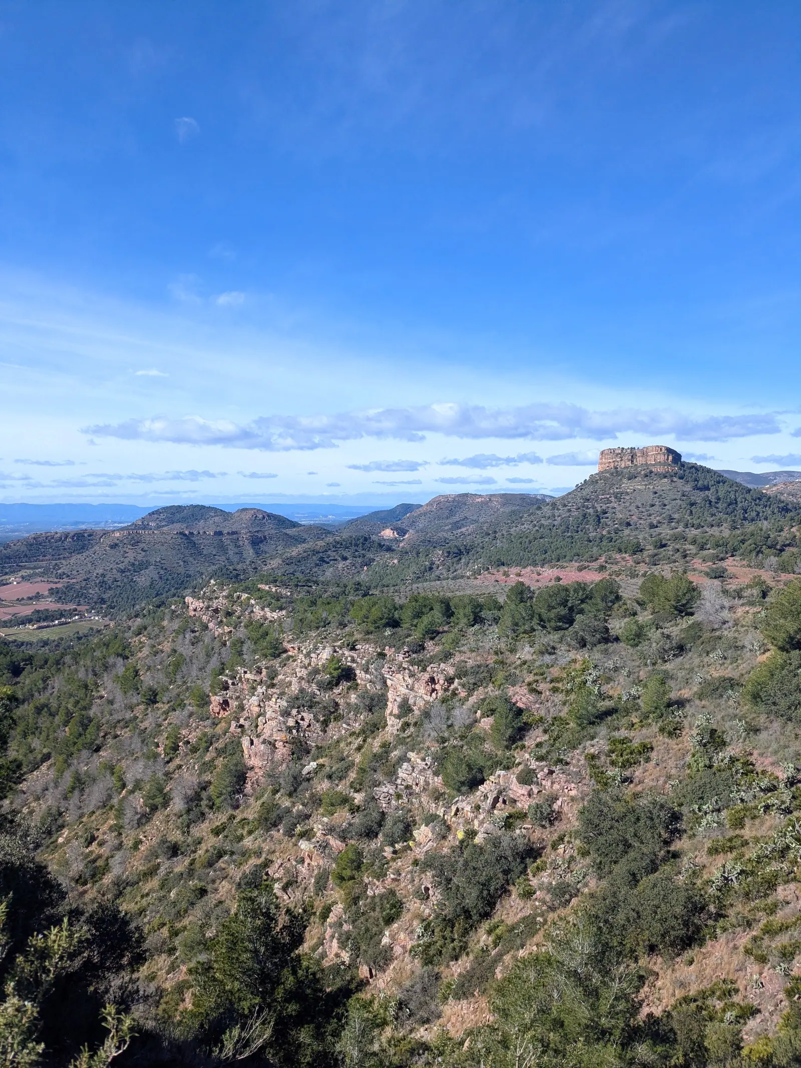 Mountain ridges and red cliffs on the seven-peaks circuit above Gilet