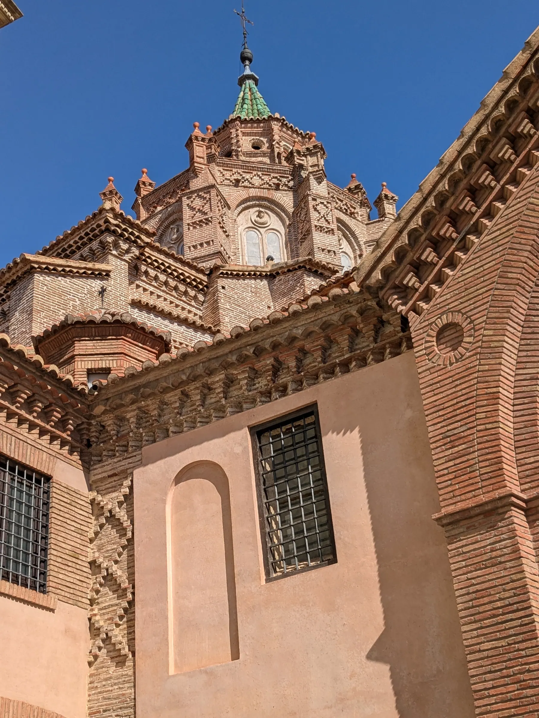Brickwork and coloured tiles on Teruel Cathedral