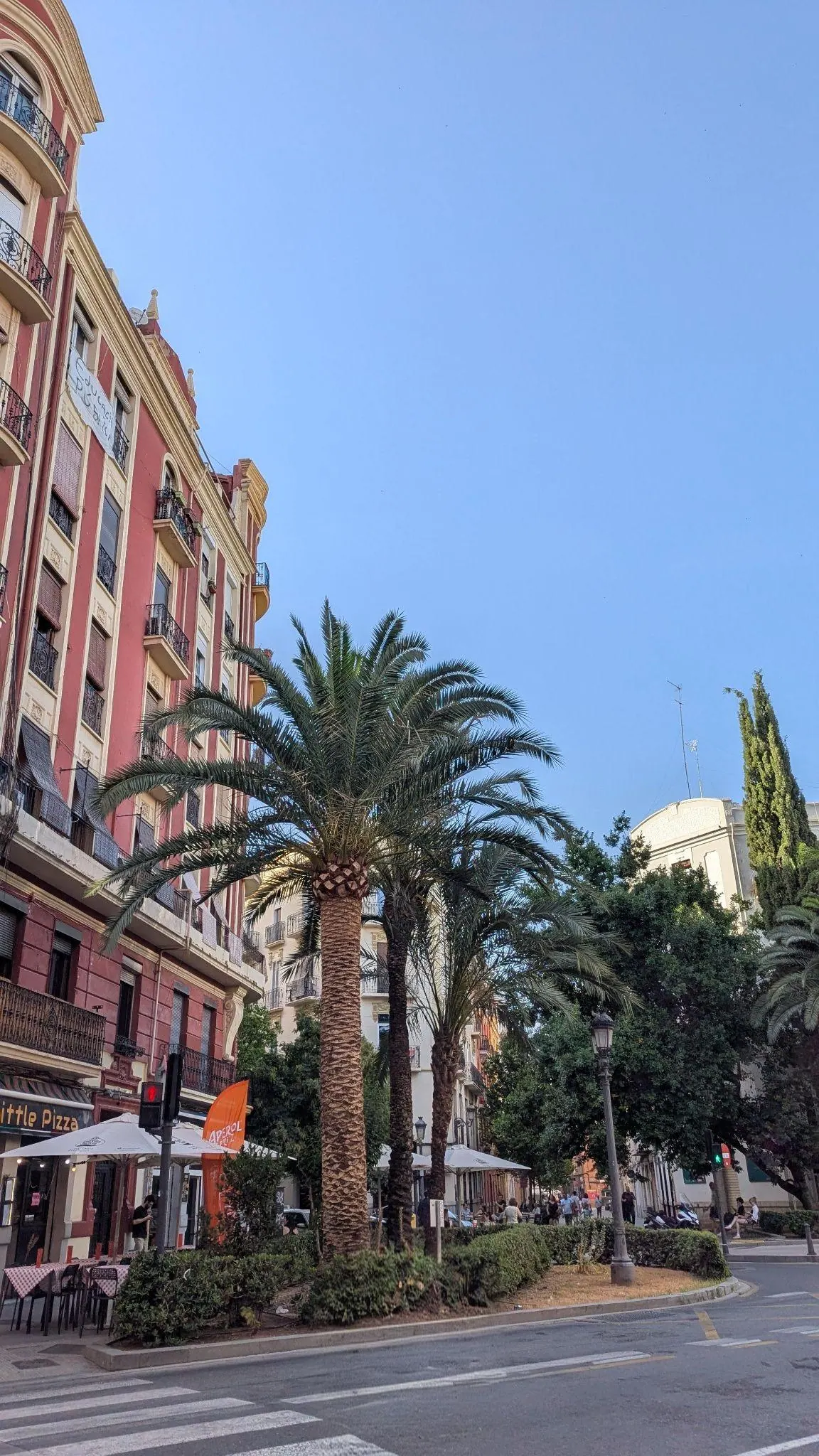 Colorful multi-story apartment buildings with wrought-iron balconies in Ruzafa