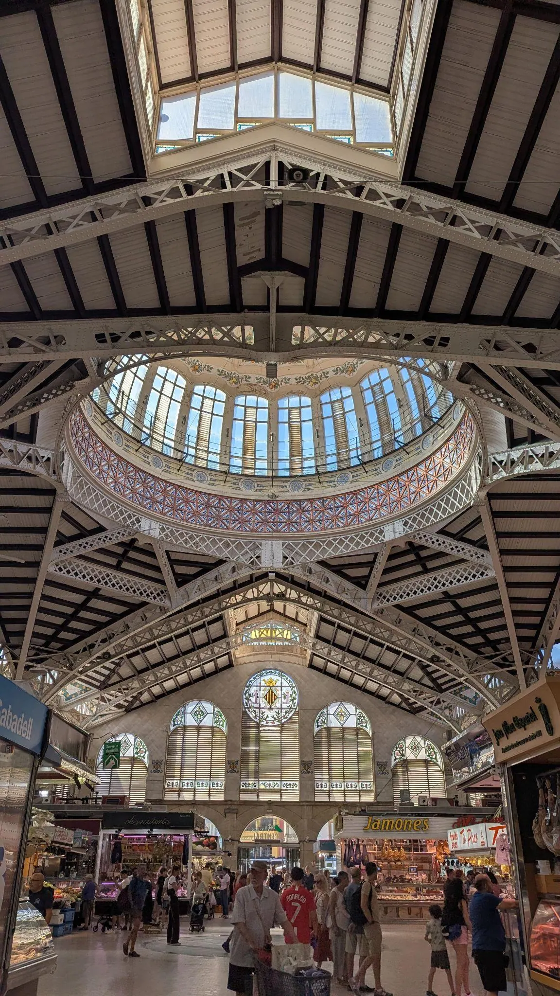 Ornate ceramic tile facade and arched entrance of Mercado Central de Valencia