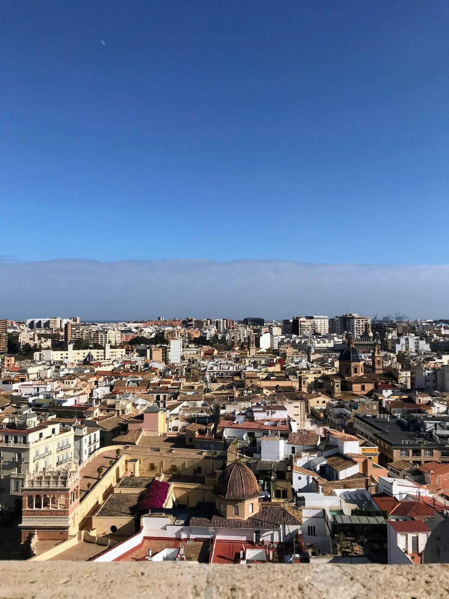 Panoramic 360-degree aerial view across the terracotta rooftops and domes of Valencia from El Micalet