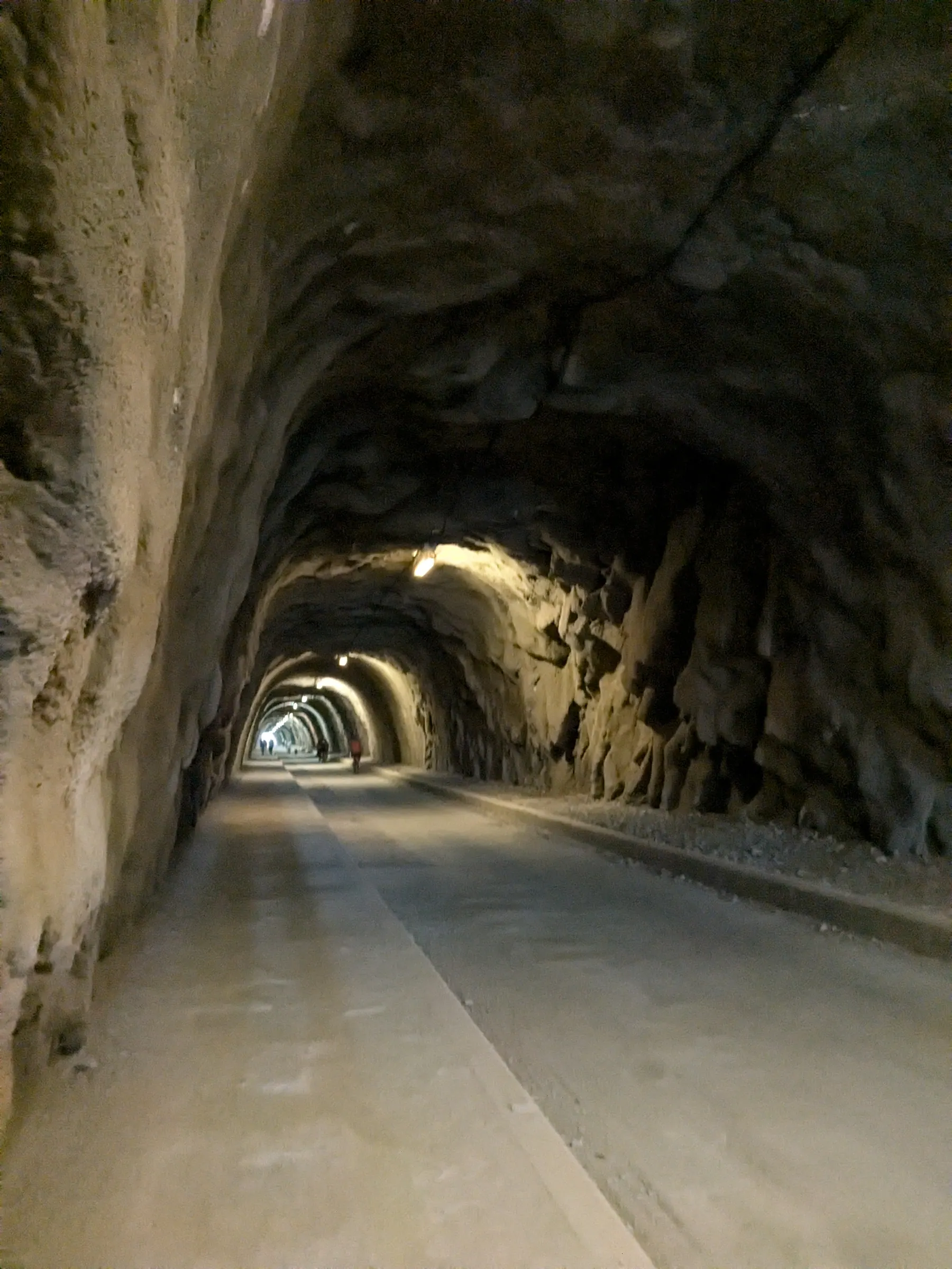 The long lit railway tunnel on the Vía Verde del Mar